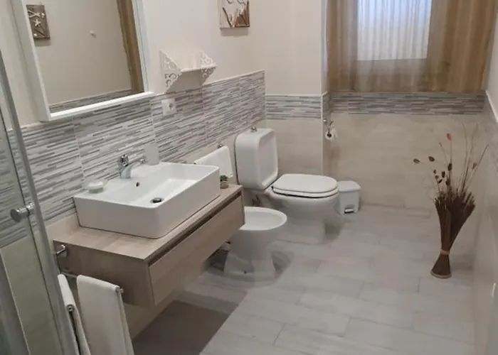 Tony & Doris Giardini Naxos